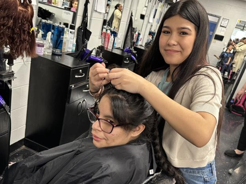 Centennial High cosmetology students style hair